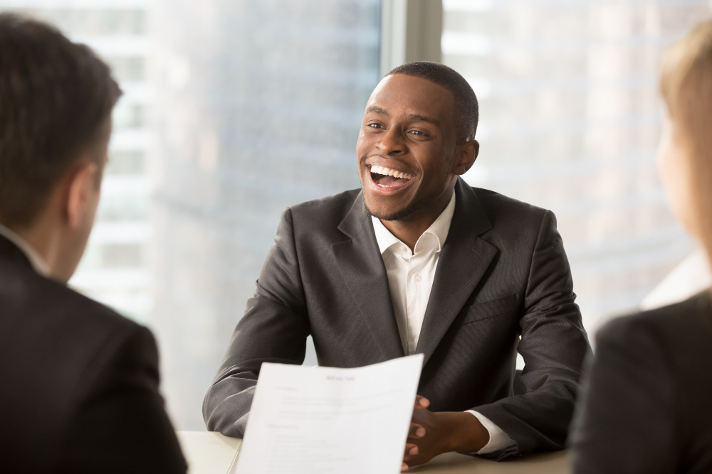 "black male getting a job offer"