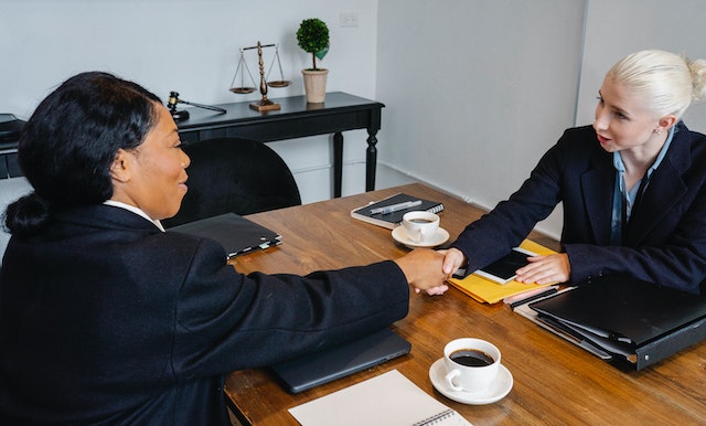 Woman receiving a project management offer