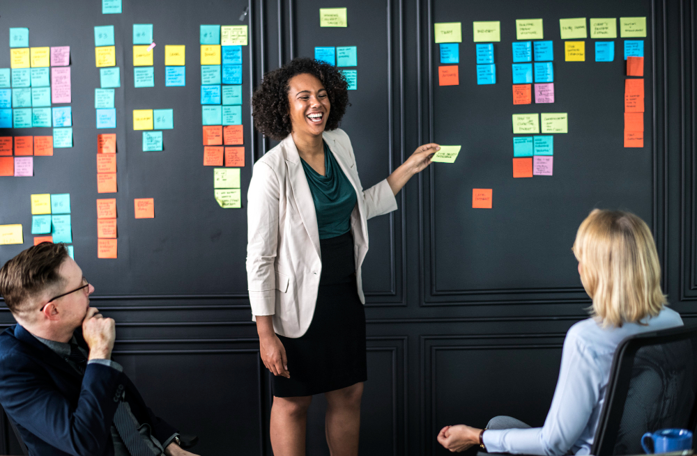 Agile Delivery Manager performing a Scrum Meeting.