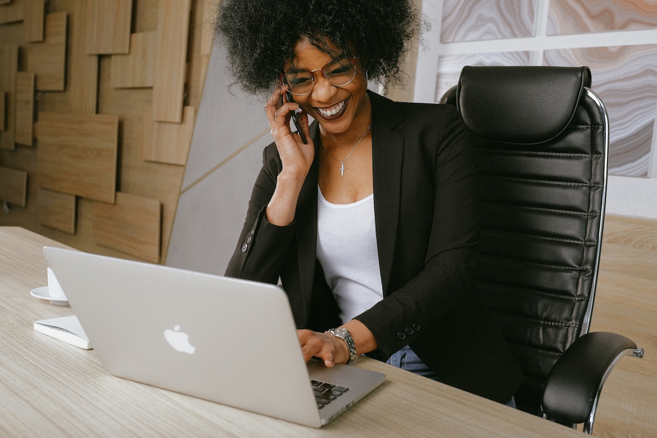 A Data and Information Service Officer on the phone