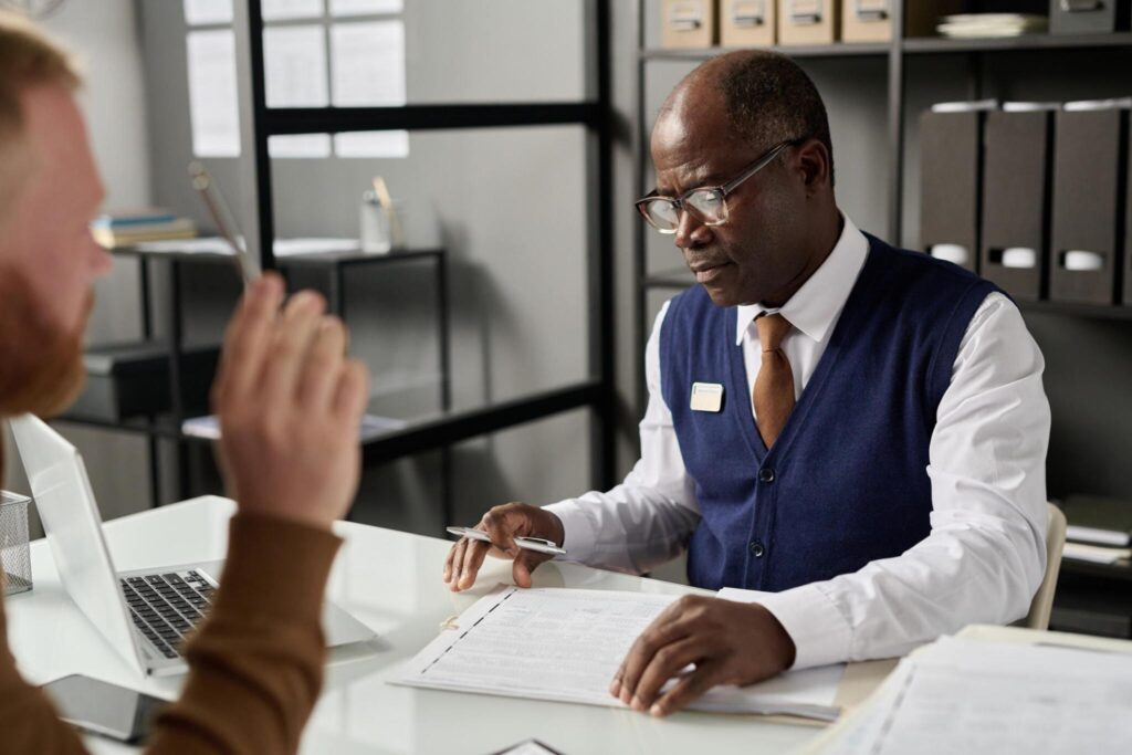 Black man offering tips for a successful visa application